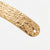 Close-up of the slim textured cuff bracelet end with small holes